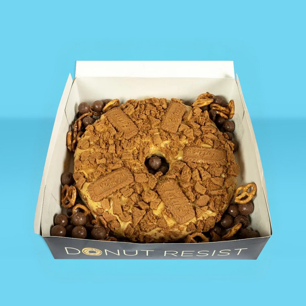Biscoff Donut Cake with Choc Malt Ball & Pretzels
