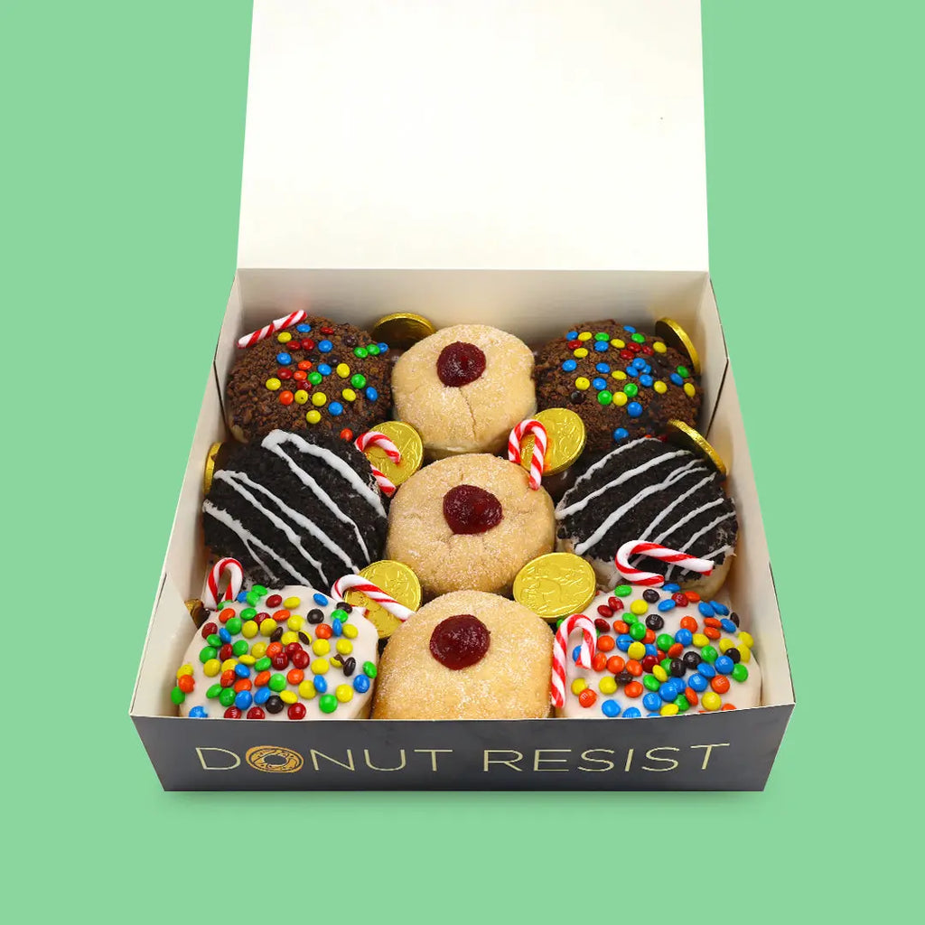 Assorted Christmas Donut Box w/ Choc Malt Ball, Candy Cane & Gold Coins - Goldelucks Same Day Gift Delivery