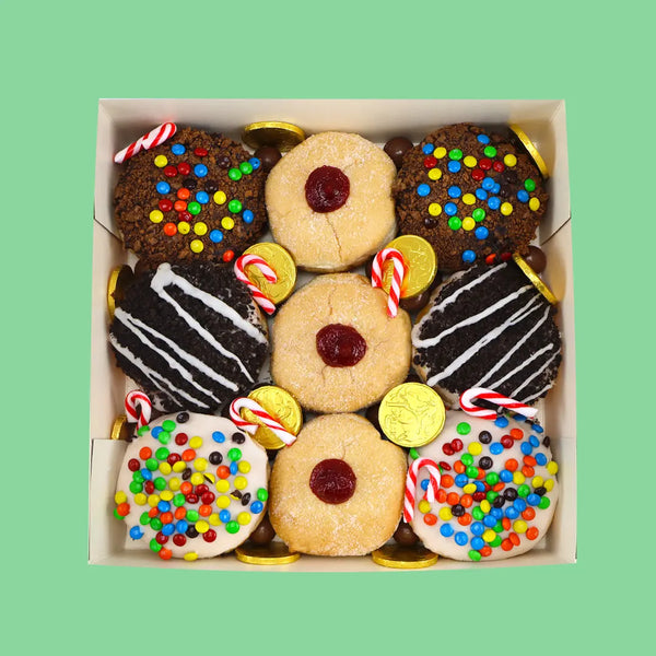 Assorted Christmas Donut Box w/ Choc Malt Ball, Candy Cane & Gold Coins - Goldelucks Same Day Gift Delivery
